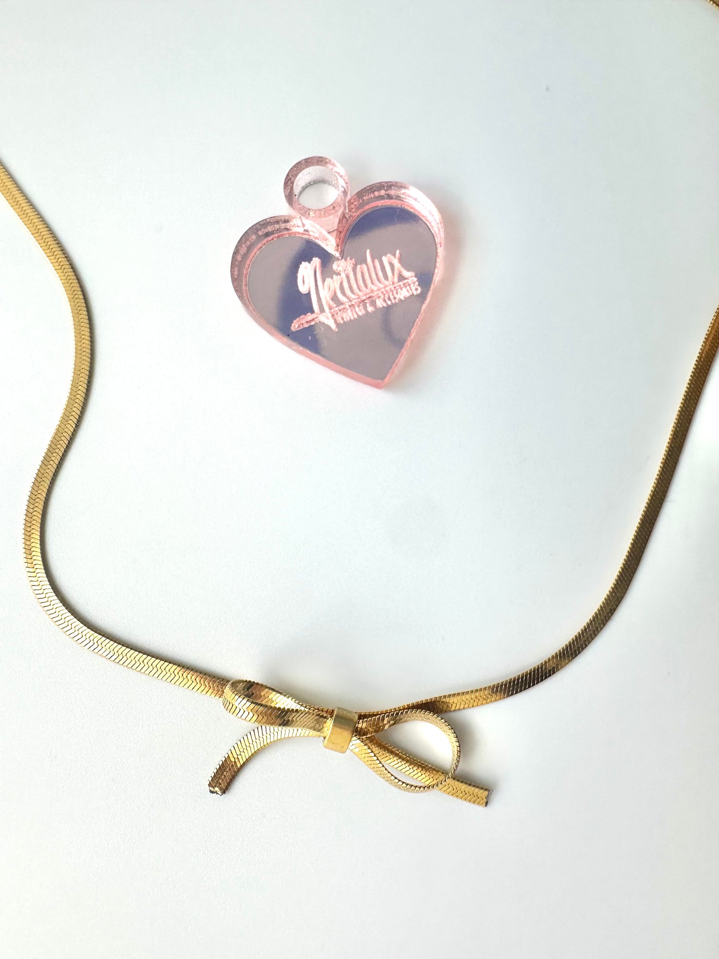 BOW NECKLACES