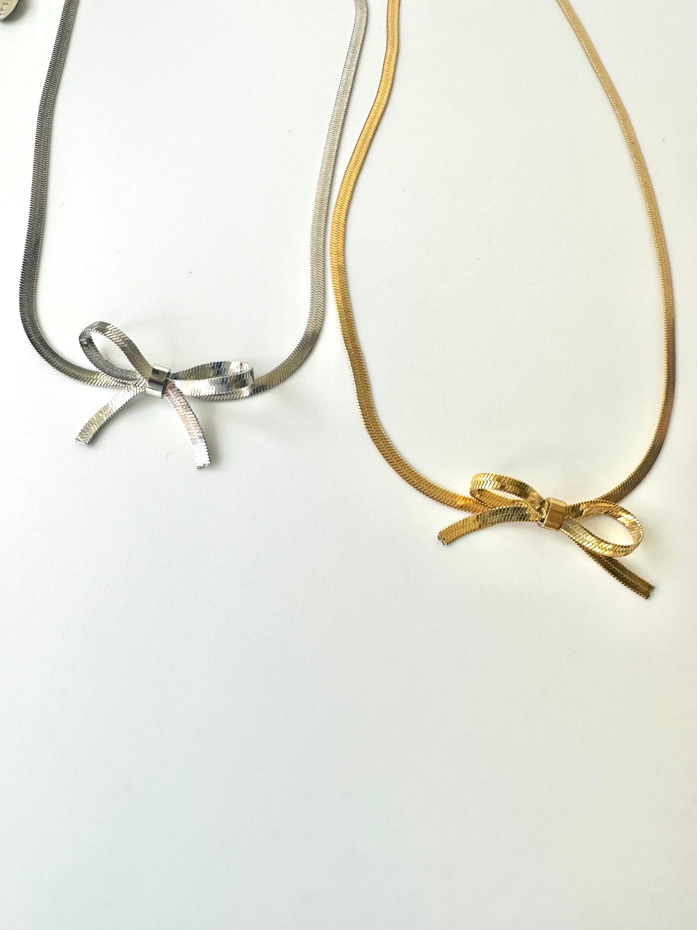 BOW NECKLACES