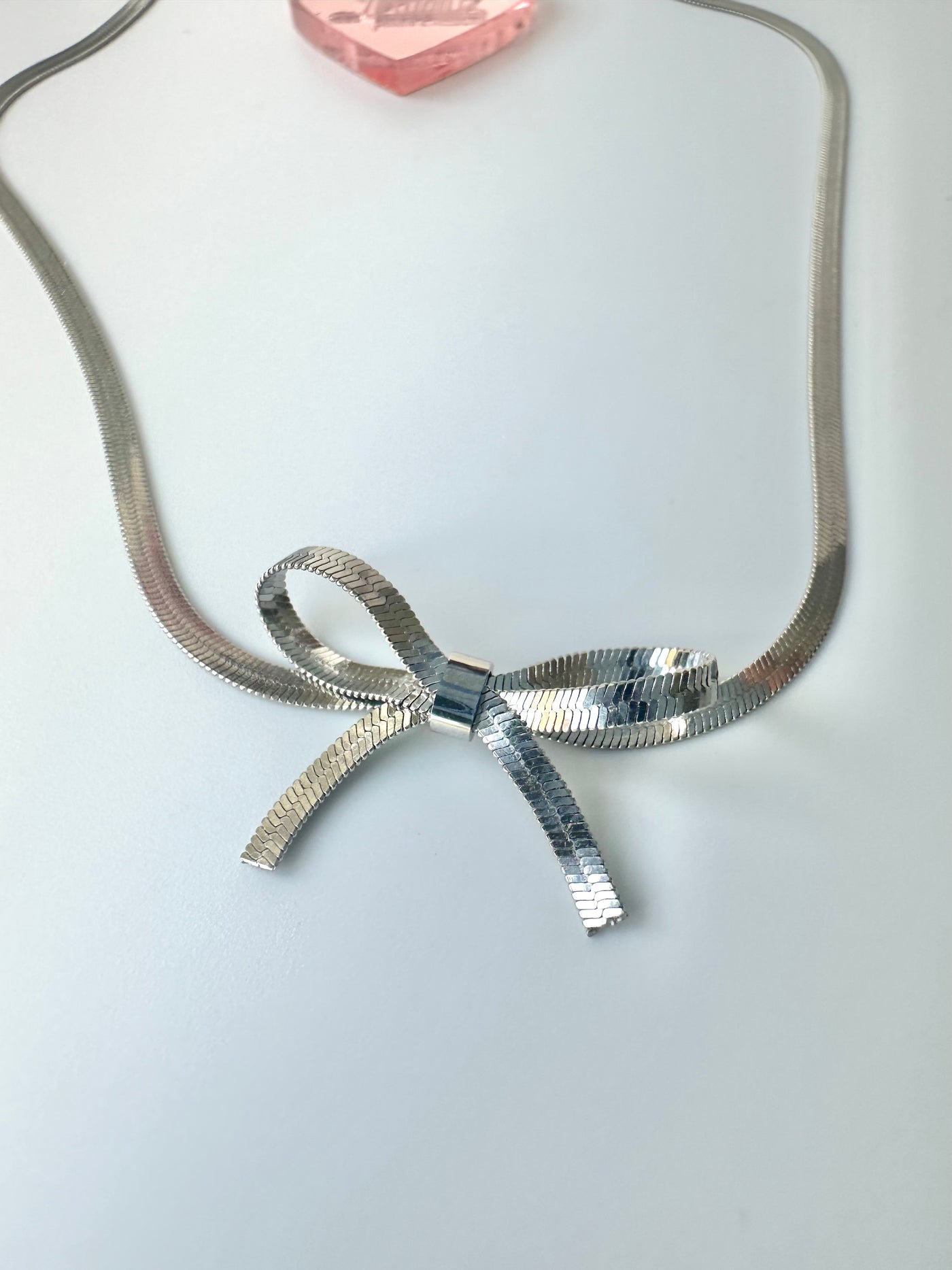 BOW NECKLACES